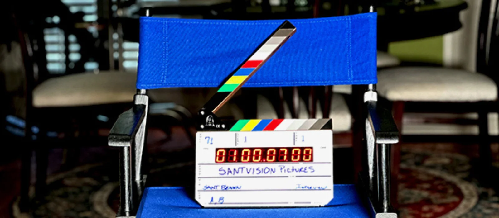 Director in edit bay reviewing a scene with headphones